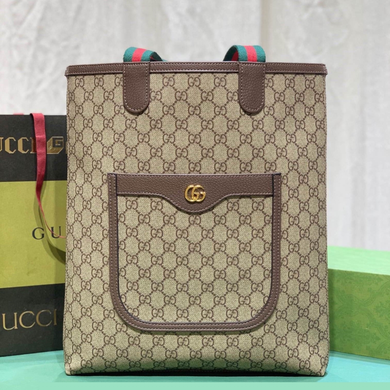 G*u*i shopping bags